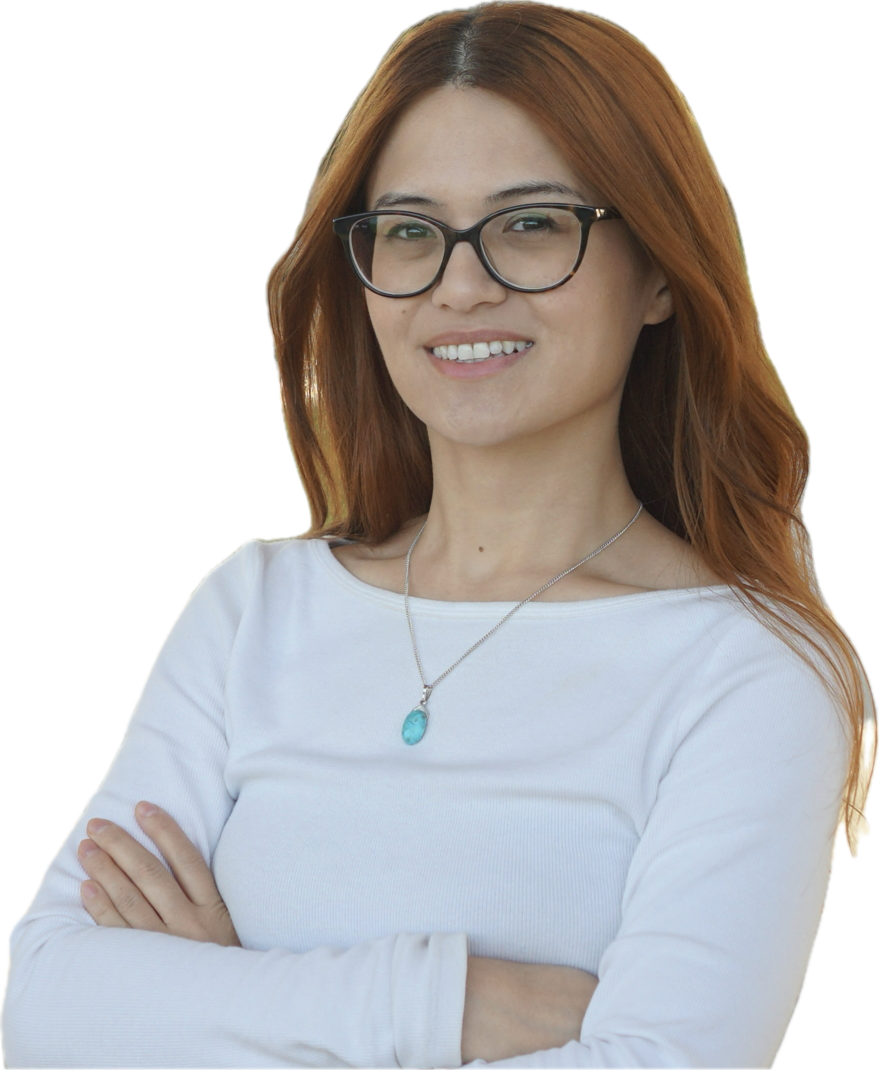 Picture of myself. I have dyed brown-red hair and am wearing a long sleeves white t-shirt and a blue necklace.